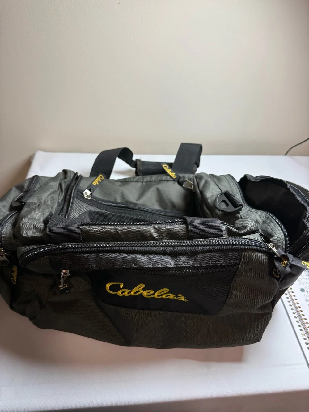 Cabela's Olive Green and Black Duffel Bag with Yellow Logo